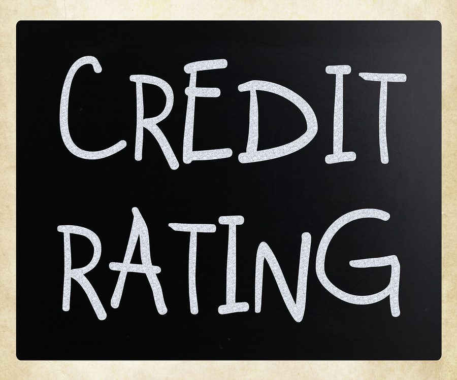 "Credit rating" handwritten with white chalk on a blackboard